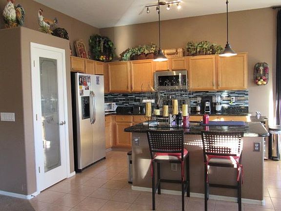 Updated kitchen with granite and stainless steel appliances