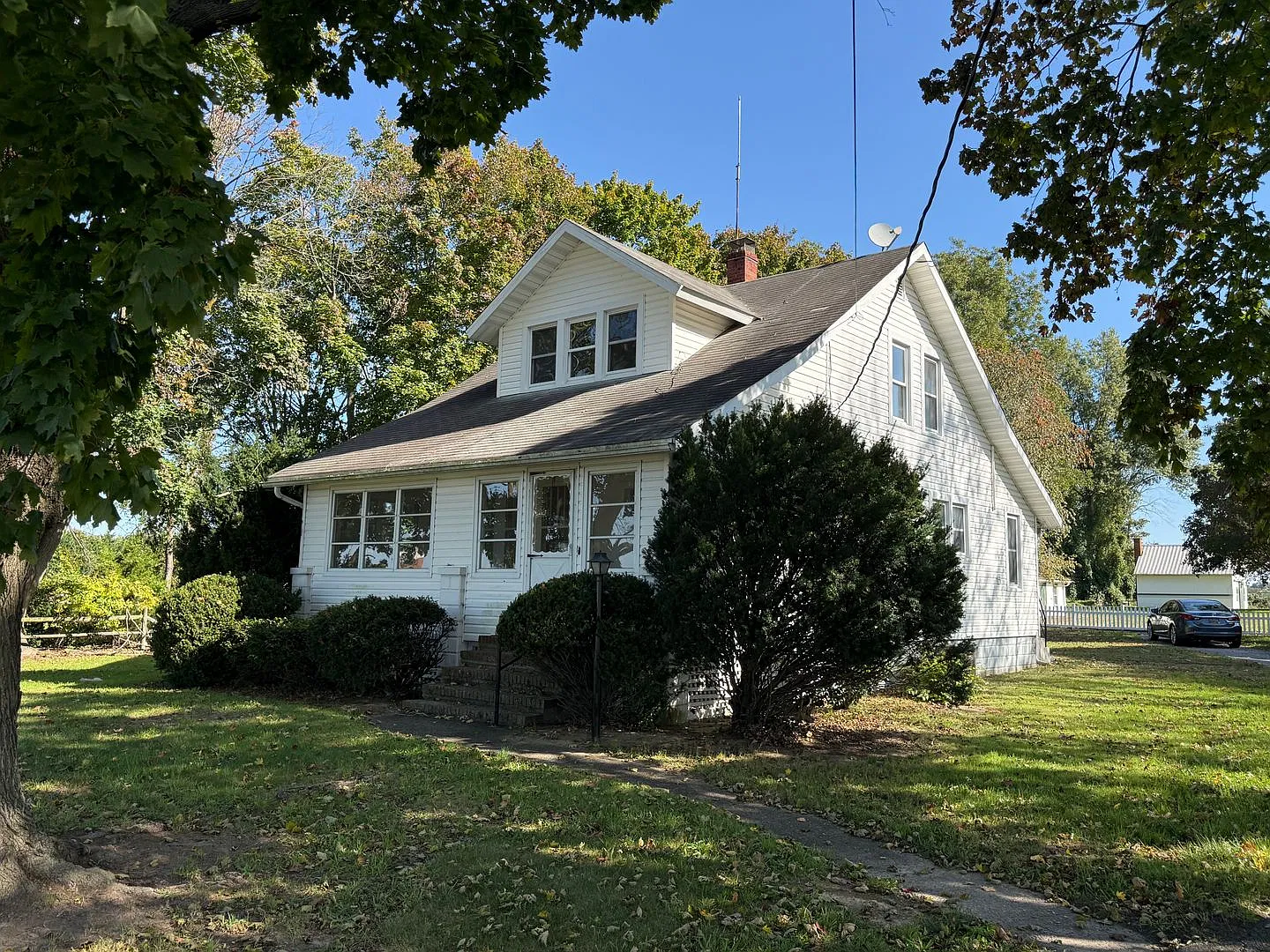 Charming Farmhouse with Fresh Paint and a Spotless Interior Ready for Year-Round Living! — Photo 1