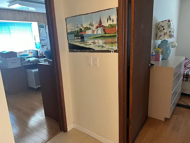 Hallway to the fourth & fifth bedrooms. The house will be rented with as much of its existing furniture as the tenants want.
