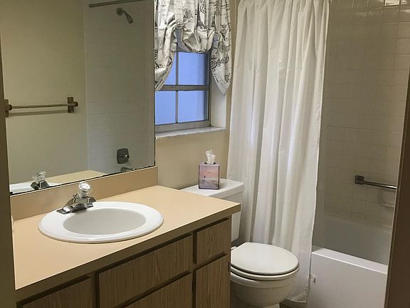 Bathroom with pantry for towel storage