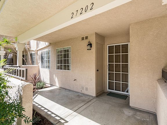 Private patio at entry to unit