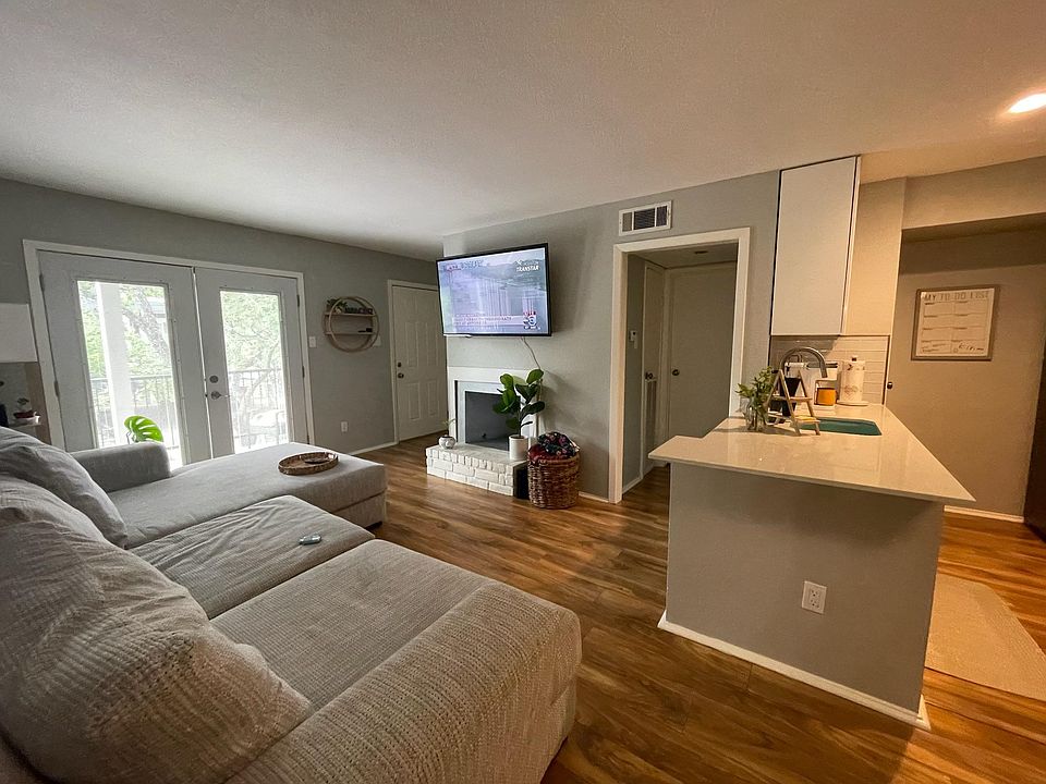Living room pic with open kitchen
