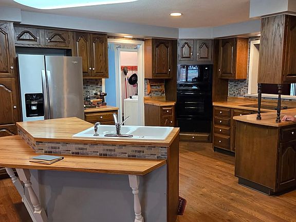 kitchen - appliances included. Off this room is laundry area and electric washer and dryer are included