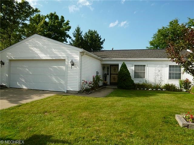 DARLING 3 BEDROOM RANCH CONDO WITH 2 CAR ATTACHED GARAGE