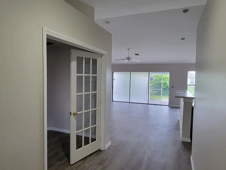 Entering Home. Den on left.