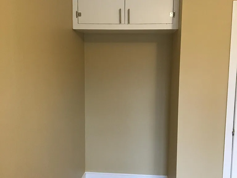 Built in cabinet front bedroom with nook for dresser or desk