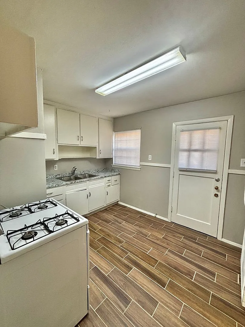 Village Apartments — Photo 3