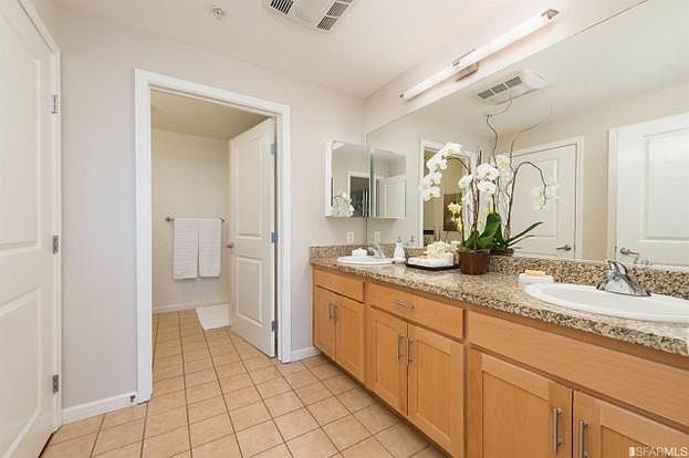 Large bathroom. Jack and Jill sinks, tub and shower. Laundry in bathroom