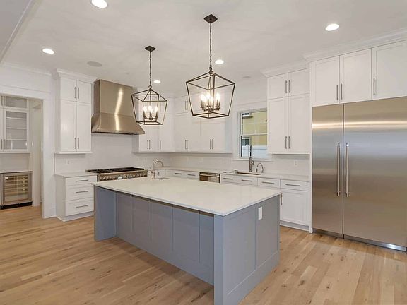 Range wall, hood, and island in perfect alignment