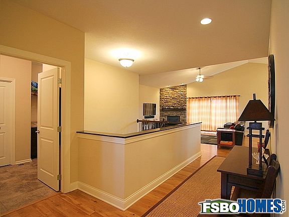 Open Floor Plan with Adjacent Laundry Room and Garage Access