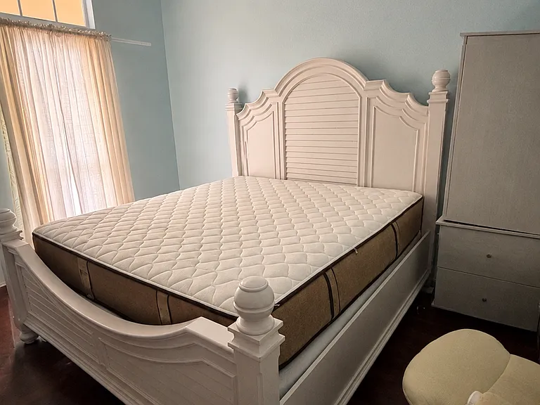 Bedroom 2- Fits a king size bed with nightstand and large cupboard. Lots of closet space along an entire wall.