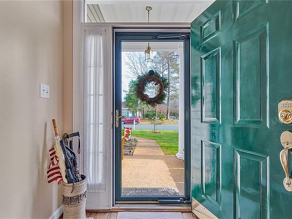 Efficient storm door entry
