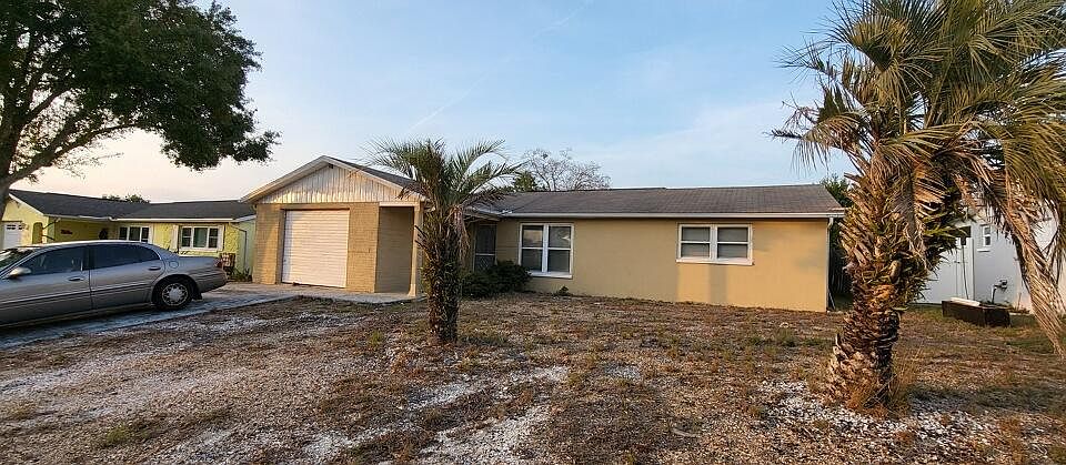Exterior of the front of the house which is being painted.