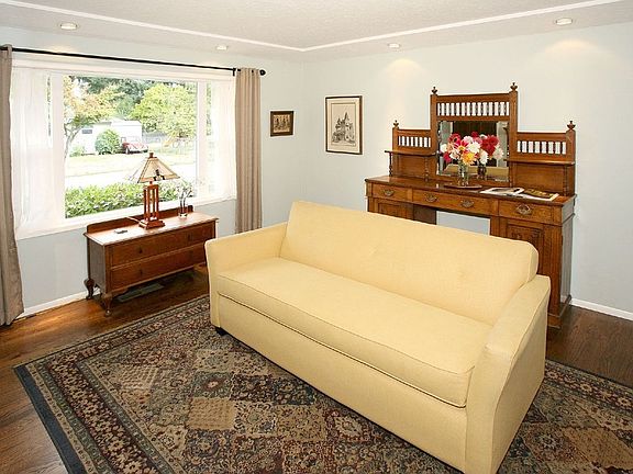 Walnut-stained hardwoods, recessed lights 