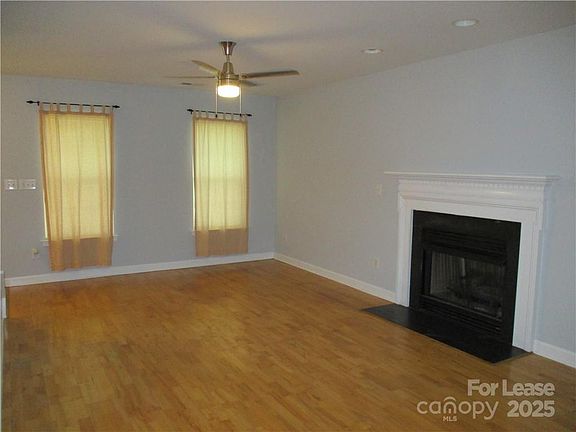 another view of great room and gas fireplace.