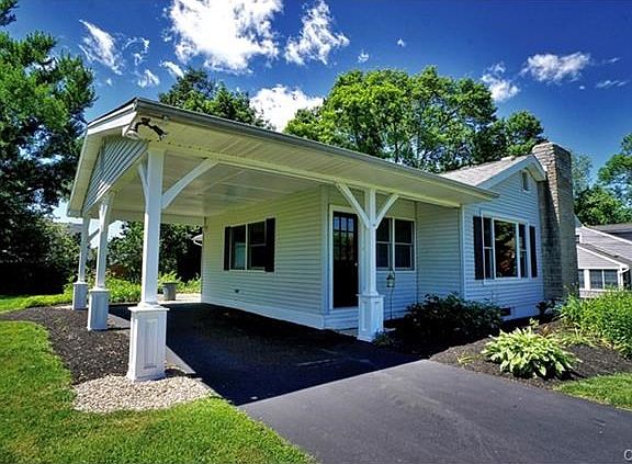 Convenient carport can can be converted into a garage