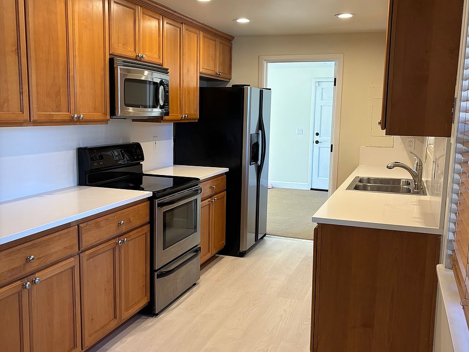 Updated kitchen with quartz countertops & new dishwasher
