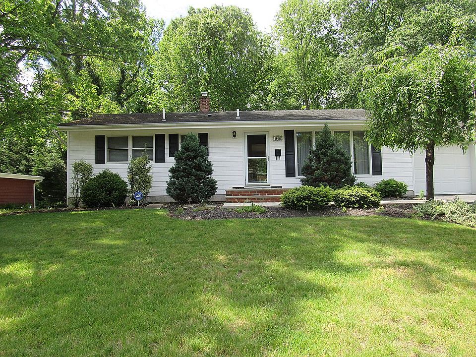 Front lawn with sprinklers
