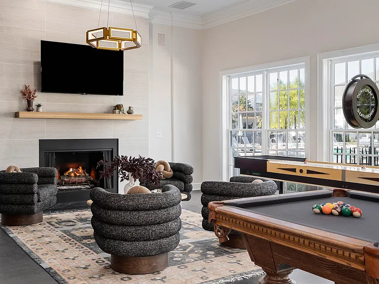 Game Room Lounge with television & fireplace.
