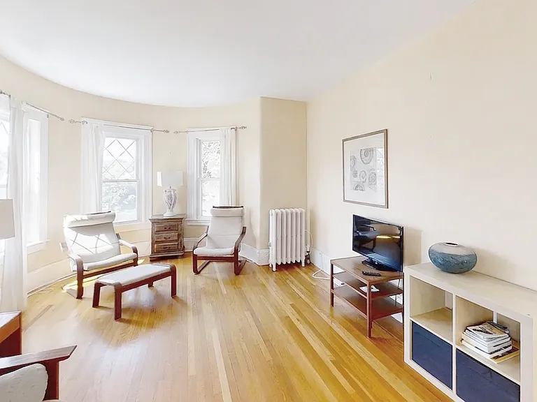 Living room pre-repairs. Available un-furnished or furnished for a higher price.