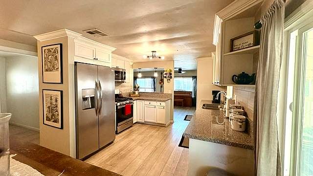 1st image of 4660 N River Rd Spc 150