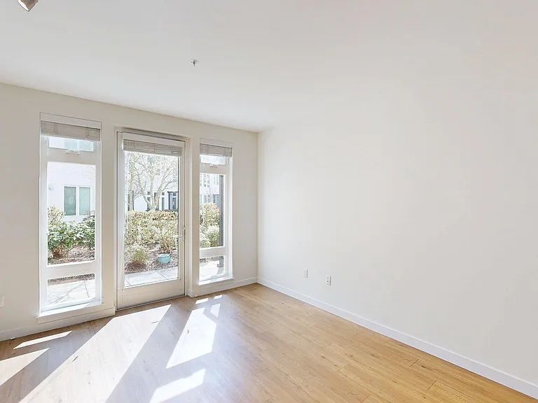 Apartment Living Room with Wood-Style Flooring.