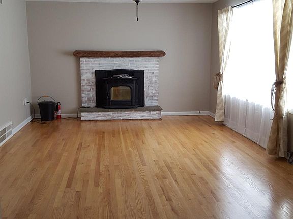 Living room with pellet stove heating option