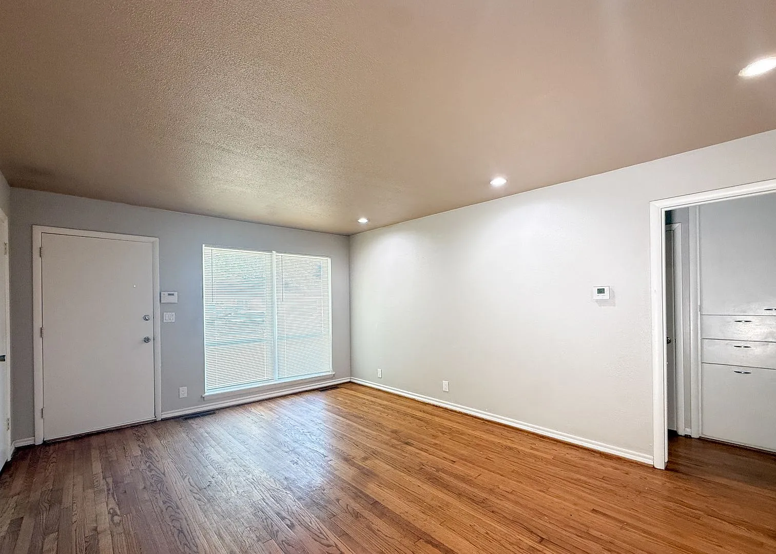 3116 NW 65th St | Hardwood Floors + Sunroom | NW OKC — Photo 3