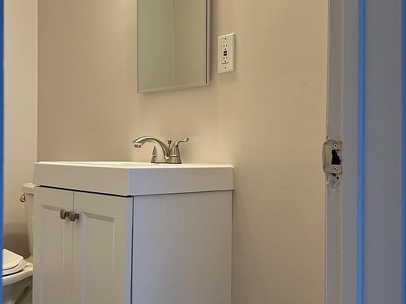 bathroom off bedroom 1