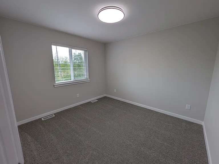 Bedroom 2, facing back of duplex.