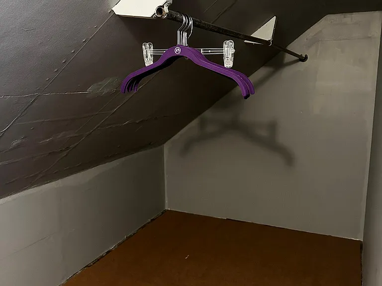 Walk In Closet (One of Two) 14' X 6' with sloped ceiling