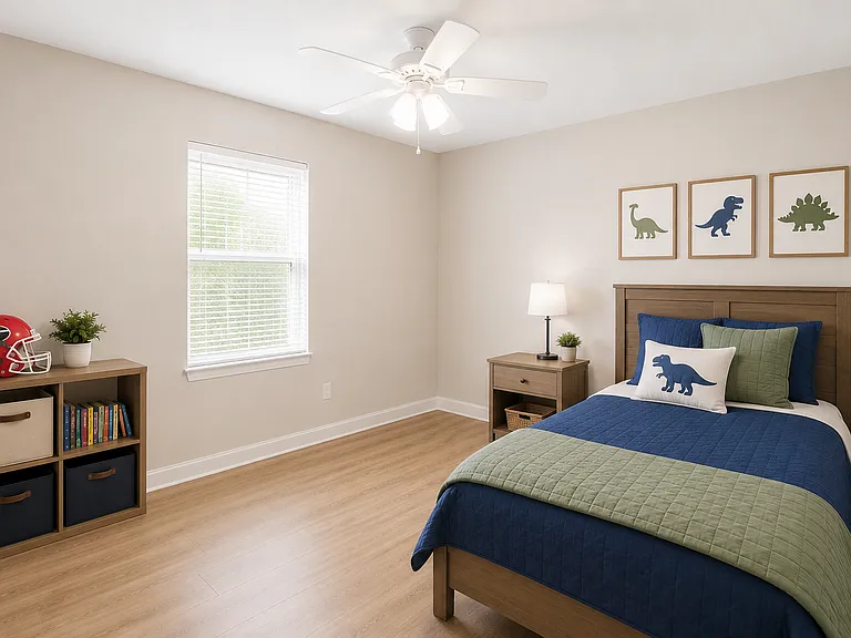 The second bedroom offers cozy comfort with matching luxury vinyl plank flooring, a large window for natural light, and a versatile layout perfect for guests, a home office, or a child's room