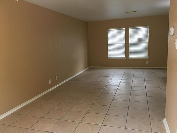 Tiled living/dining areas downstairs