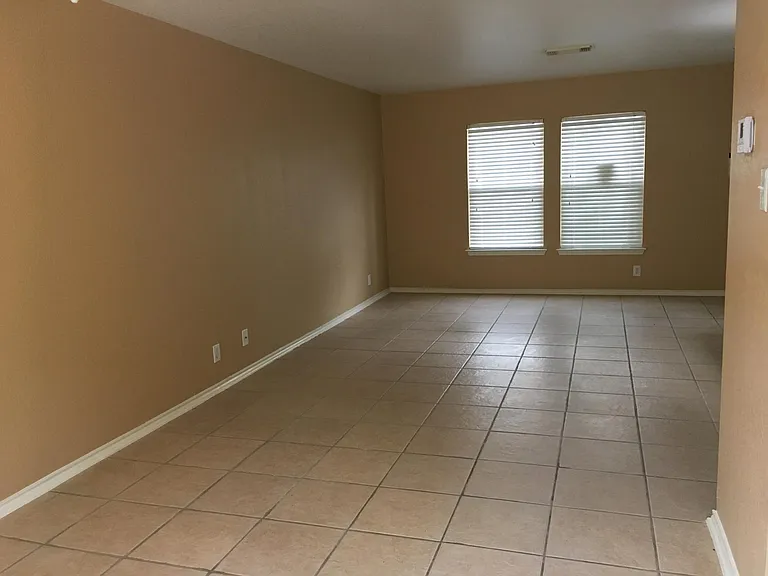 Tiled living/dining areas downstairs