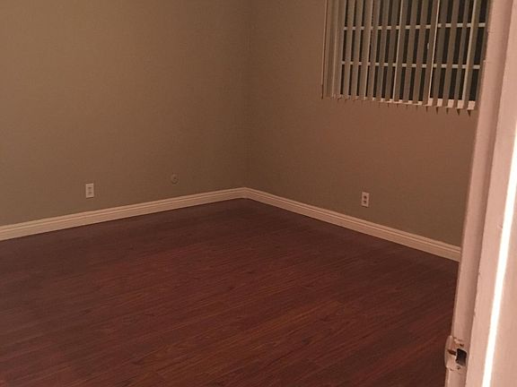 First bedroom, new laminated floor, and paint