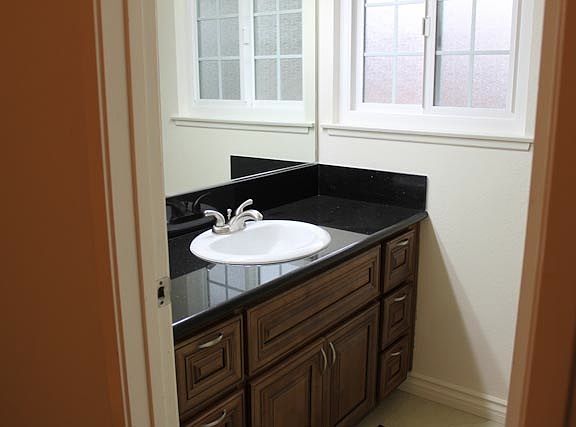 Granite Countertops in all Baths