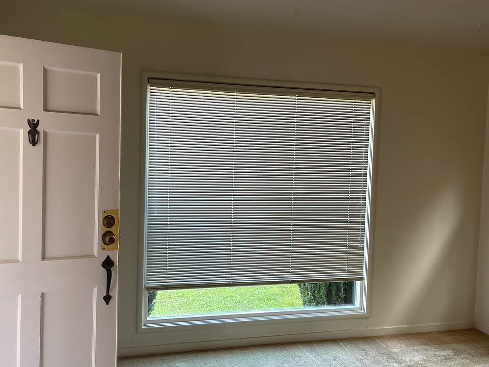 FRONT DOOR INTO LIVING ROOM