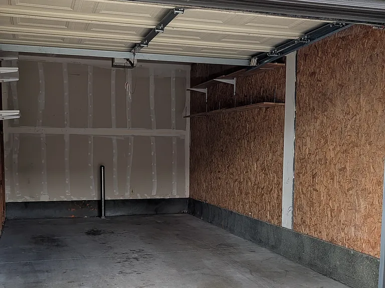 One car garage + 1 parking space in gated community