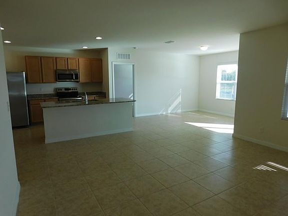 View from Living Area to Kitchen and Dining