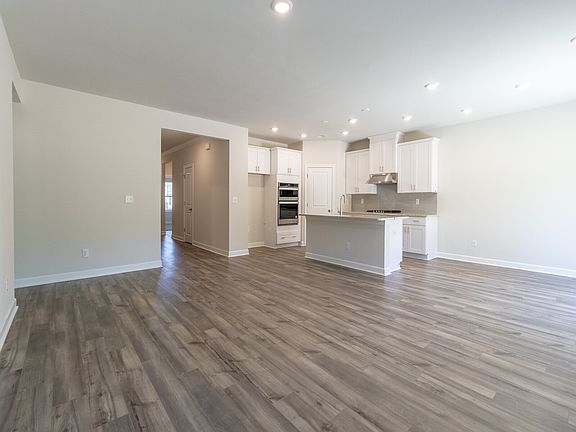 Enjoy the open-concept living area perfect for hosting family and friends.