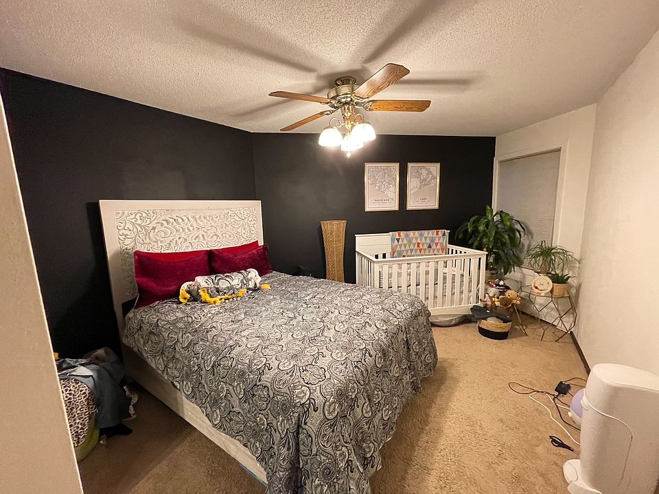 bedroom large enough to fit queen bed and extra square footage to put a desk, crib, lounge area.