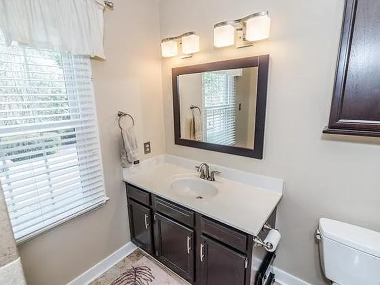 Fully renovated Master bath with comfortable shower stall.