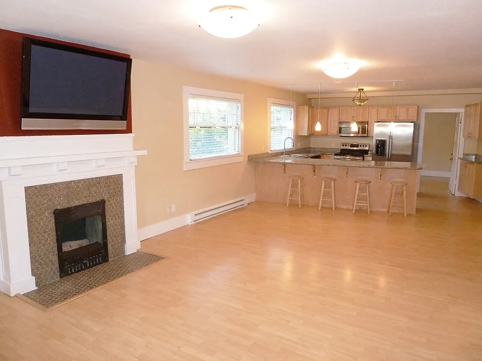 50" Flatscreen over Decorative Fireplace