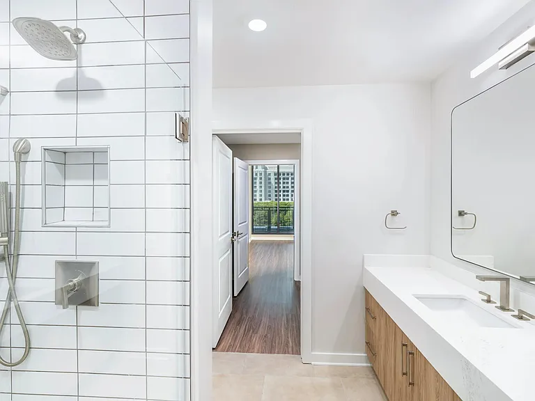 Elevate your everyday routine at Modera Parkside with designer bathrooms featuring double vanities and luxurious quartz countertops. Enjoy the spa-like experience of frameless glass showers surrounded by stunning floor-to-ceiling tile, all in the heart of
