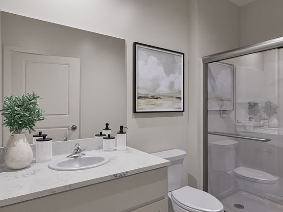 The master bath offers a step in shower.