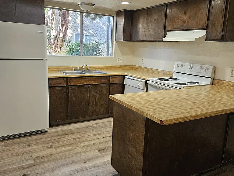 Whispering Trees Apartments — Photo 16