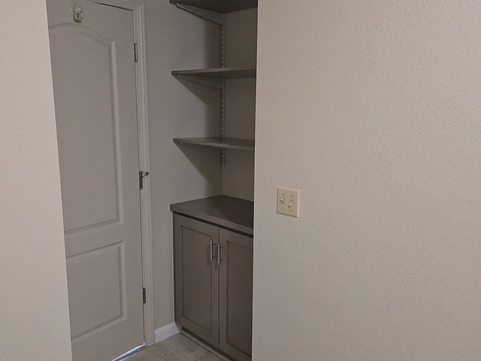 Master Bathroom extra storage area.