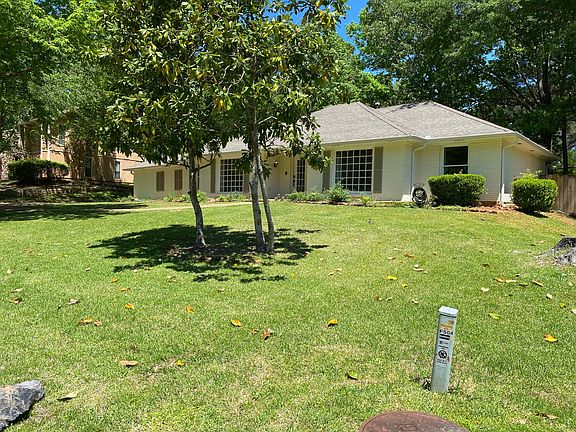 Front of house at side property line.