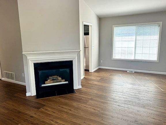 Main level living spaces offer LVP flooring.