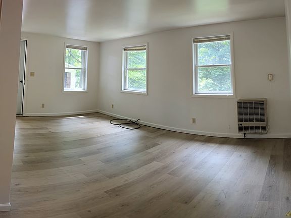 living room with propane heater